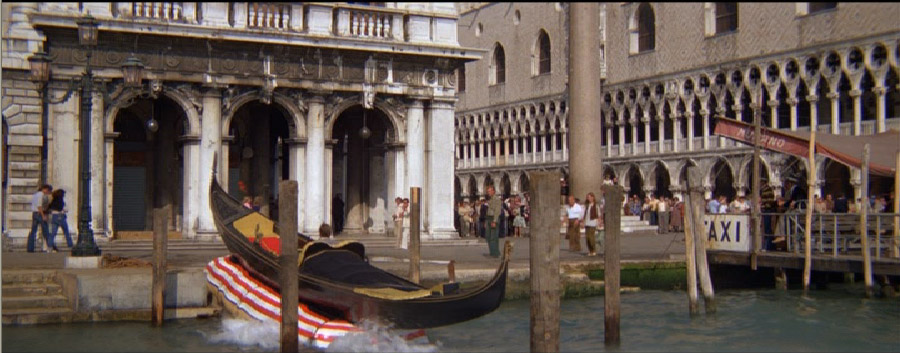 Roger Moore changed costumes five times before he managed to come up md car from the water at St Markusplts in Venice.
