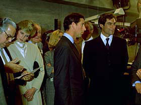 Prince Charles and Lady Diana inspection at Pinewood studios with Broccoli and Timothy Dalton